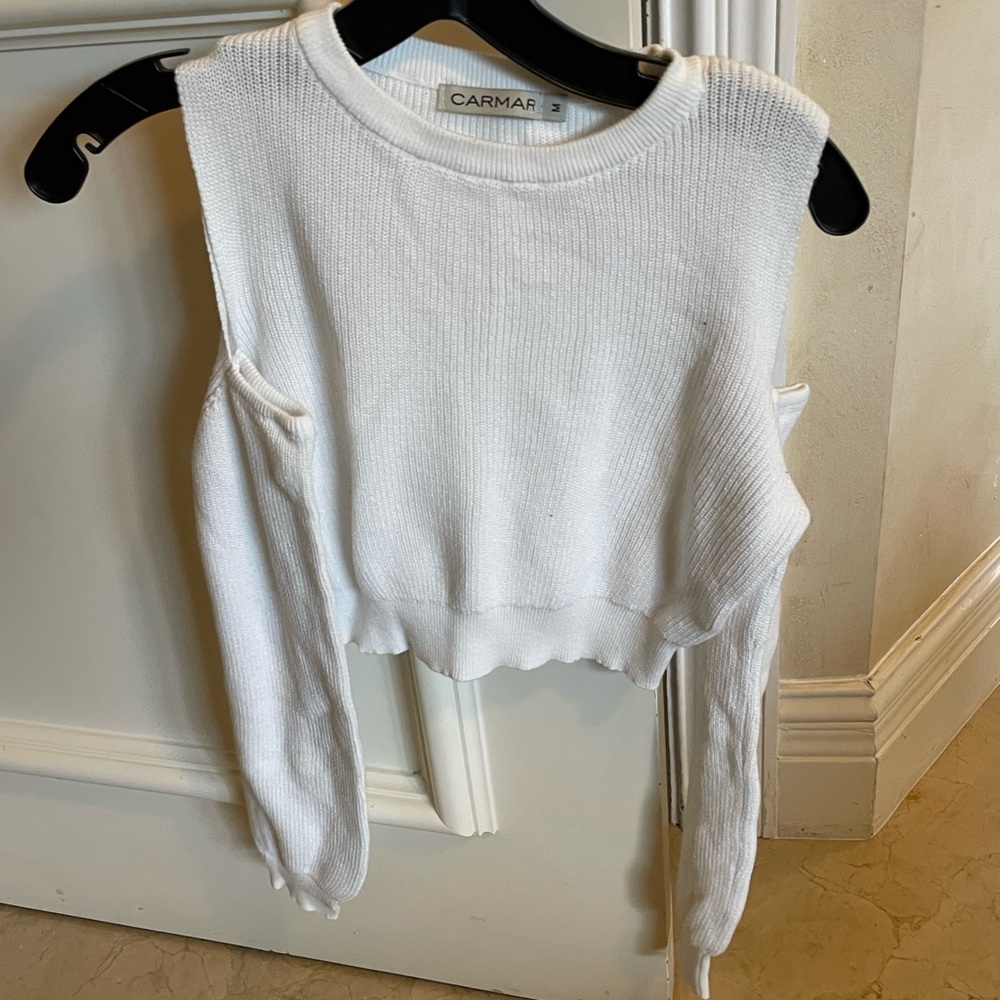 White cropped sweater with exposed shoulder